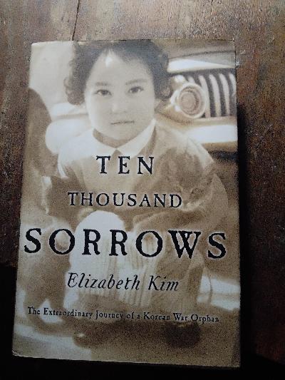 Ten Thousand Sorrows  The Extraordinary Journey of a Korean War Orphan - Front Cover